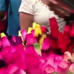 Man Makes the Day of Flower Selling Women